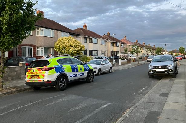 Officers have arrested the owner of a dog after a man was bitten in Aintree this evening