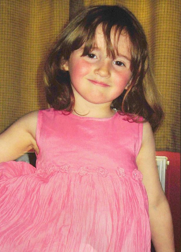 April Jones in a pink dress
