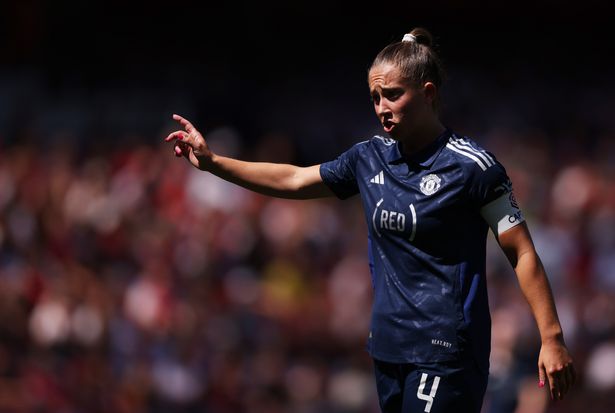 Manchester United's Maya Le Tissier pictured wearing the away shirt against Arsenal sponsored by (RED)