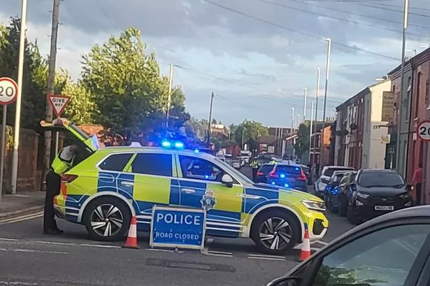 Police closed Litherland Road in Bootle after a man came off his motorbike