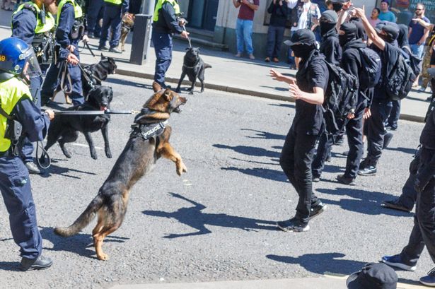 Hundreds of anti fascist protestors clash with police in central Bristol