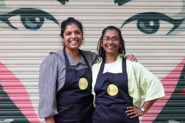 Kalisha and Aleena Patel outside what will soon become Bristol's first baking experience venue, Bake It! Bristol, on East Street in Bedminster