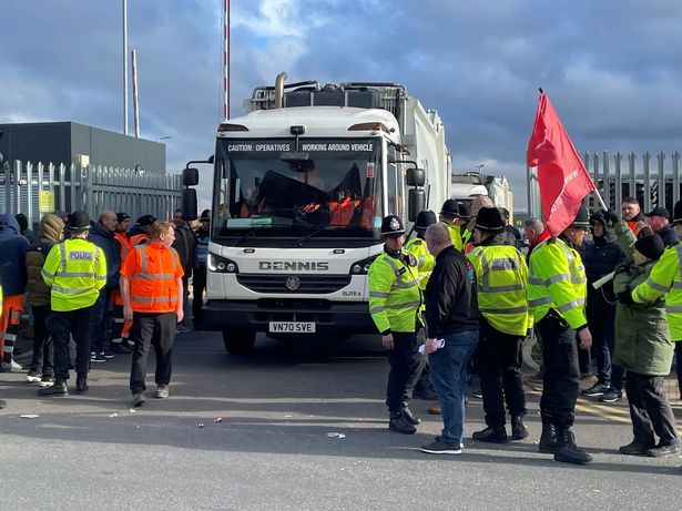 Police officers on hand as members of Unite go on the picket line at Birmingham City Council's Atlas Depot in Tyseley