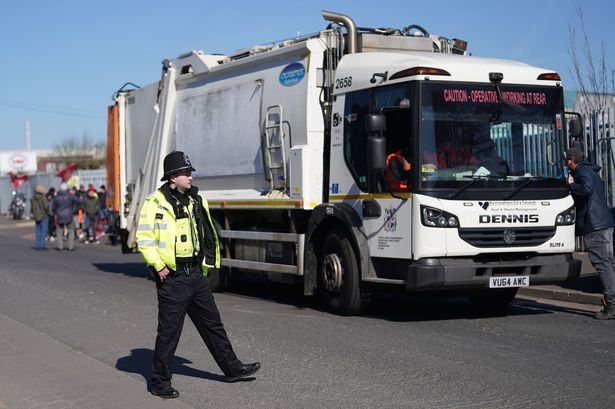A West Midlands Police officer in Tyseley, amid the ongoing bin strikes