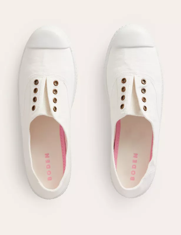 The crisp plimsolls have a clever laceless design