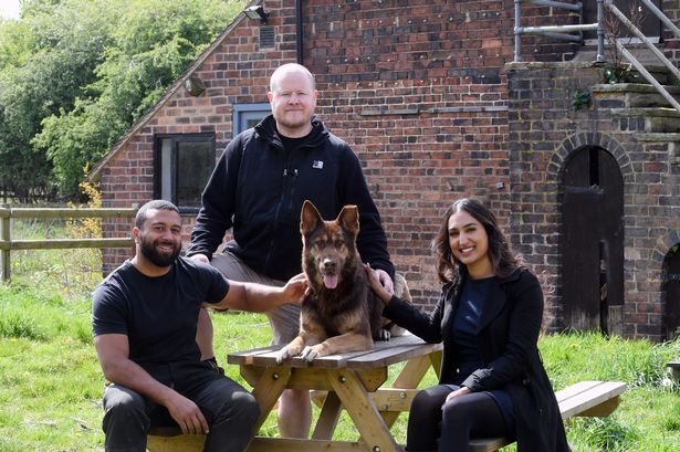 Nathaniel Lewis, Willow, Jarryd Bassett and Mandeep Padan of Warwickshire Property & Development Group at the new canine centre in Warwickshire 