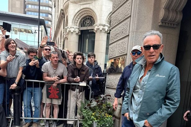 Bruce Springsteen outside Gary Neville's Stock Exchange Hotel