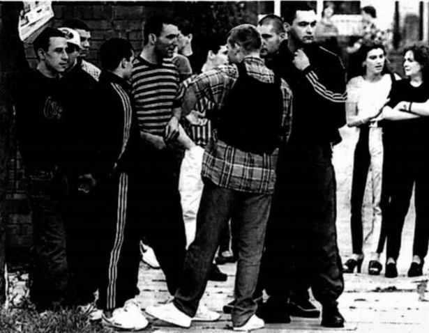 Toxteth residents, including a man wearing a bullet proof vest, on the streets on May 31 1995, after frustration linked to the murder of David Ungi boiled over
