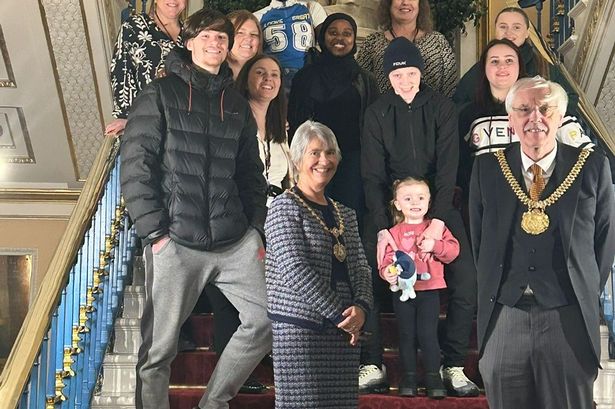 Lord Mayor Richard Kemp, together with Erica Kemp and members of the Care Experienced Forum on a visit to the Town Hall as part of their 'This place is yours' work.