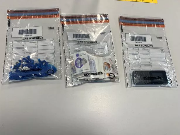 Drugs, cash and a phone seized by police