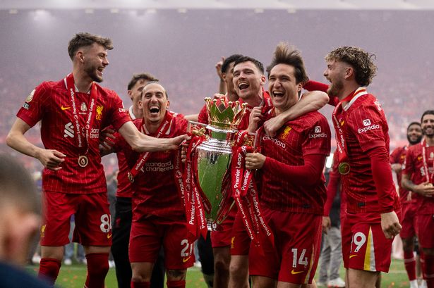 LIVERPOOL, ENGLAND - MAY 25: Conor Bradley, Konstantinos Tsimikas, Andrew Robertson, Federico Chiesa, Harvey Elliott celebrate with a trophy as Liverpool are crowned the Champions of the Premier League for the 2024/25 Season, following the Premier League match between Liverpool FC and Crystal Palace FC at Anfield on May 25, 2025 in Liverpool, England. (Photo by Sebastian Frej/Getty Images)