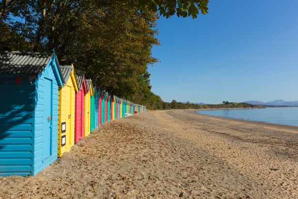 Colourful beach along a sandy beach on a sunny day