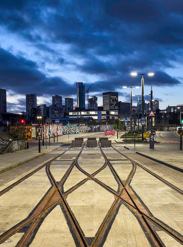 Night shot of tramlines heading into the city centre from Digbeth