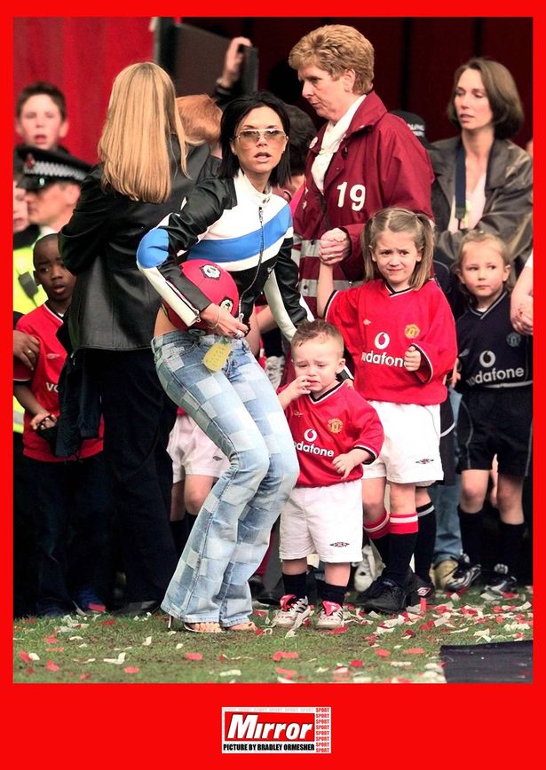Victoria Beckham and son Brooklyn Beckham, May 2001
during Manchester United celebrations for winning the Premiership Trophy / Title for the season 2000 / 2001, at Old Trafford, after their match against Derby County.