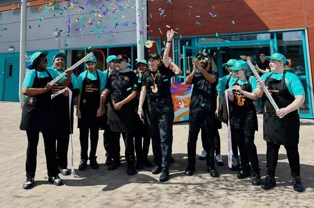 The Fort branch of Popeyes had a ribbon cutting ceremony