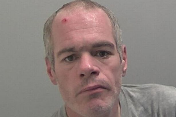 British Transport Police custody image of Damien Gloster who is white and balding with grey hair and a grey top, who was found guilty by a jury of sexually abusing two boys in separate incidents on the Cross City line in Birmingham - one on a train and another who he lured to woodland