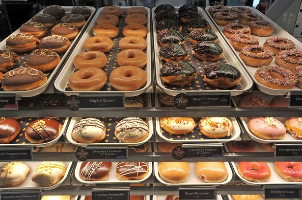 Krispy Kreme doughnuts in stands