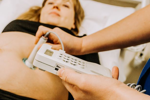 Pregnant woman having a scan
