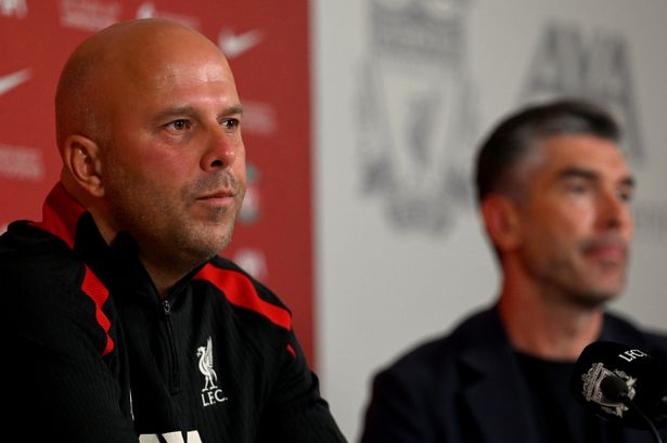 Liverpool head coach Arne Slot and Reds' sporting director Richard Hughes