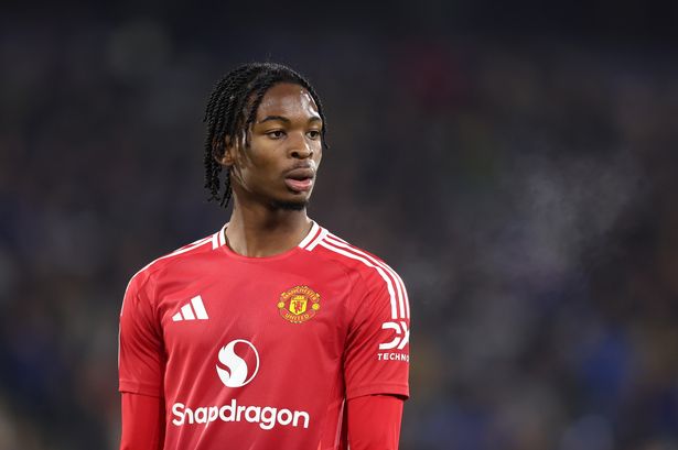 Victor Musa of Manchester United U21 looks on