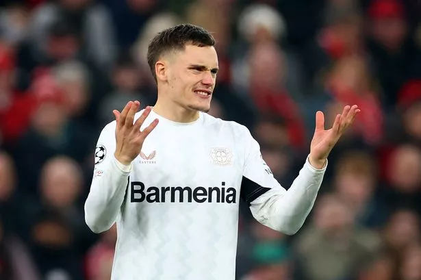 Florian Wirtz of Bayer Leverkusen reacts during the UEFA Champions League 2024/25 League Phase MD4 match between Liverpool FC and Bayer 04 Leverkusen at Anfield 