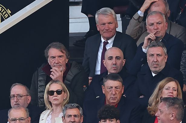 Sir Jim Ratcliffe, Omar Berrada and Jason Wilcox sit in the Old Trafford directors' box.