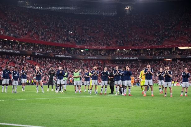 Manchester United players celebrate in Bilbao