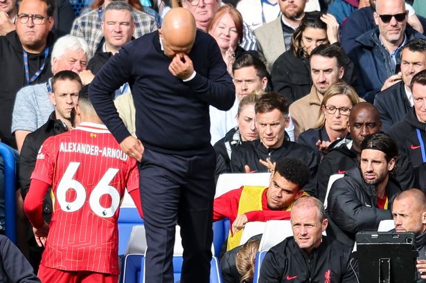 Head Coach Arne Slot substitutes Trent Alexander-Arnold of Liverpool during the Premier League match between Chelsea FC and Liverpool FC at Stamford Bridge