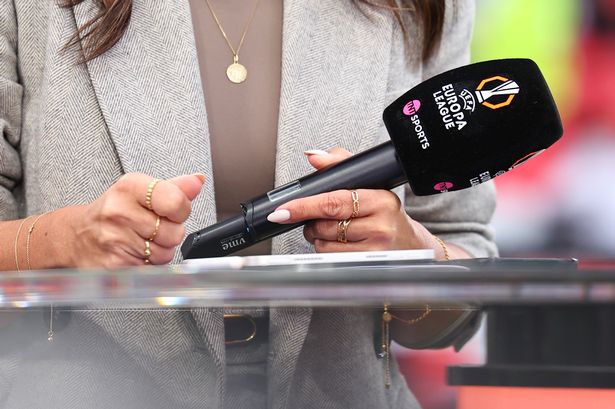 A TNT Sports microphone with Europa League branding on it.