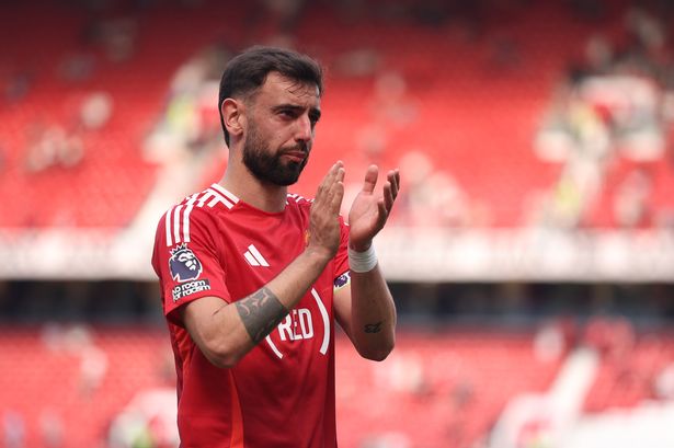 Bruno Fernandes applauds after Manchester United's defeat to West Ham United.