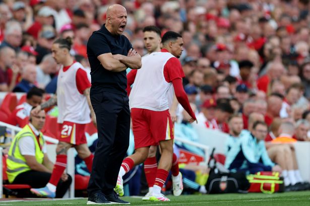 LIVERPOOL, ENGLAND - MAY 11: Arne Slot, Manger of Liverpool, reacts during the Premier League match between Liverpool FC and Arsenal FC at Anfield on May 11, 2025 in Liverpool, England. (Photo by Carl Recine/Getty Images)