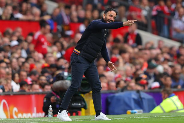 Ruben Amorim points out instructions from the Old Trafford touchline.