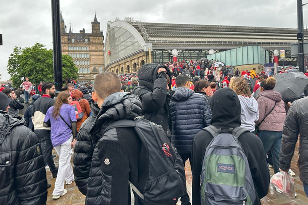 There were large queues outside Lime Street after Liverpool FC's Premier League title parade