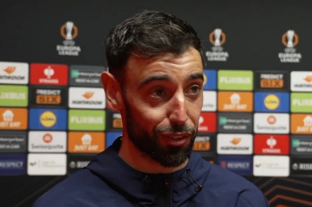 Bruno Fernandes conducts a post-match TV interview.