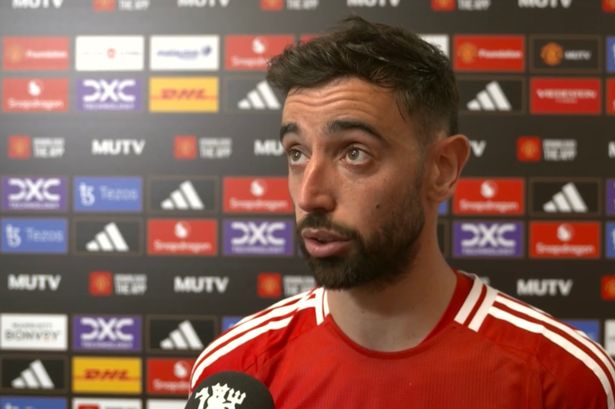 Bruno Fernandes conducts a post-match TV interview.