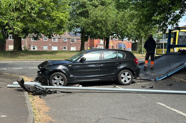A BMW crashed into a lamppost during a 'short pursuit'
