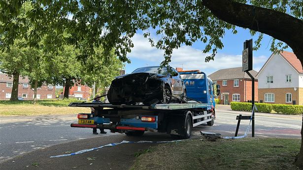 The car being removed from the scene