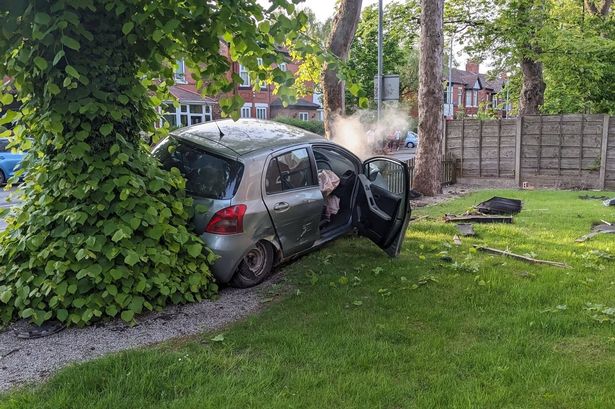 The car was ploughed into a tree after being smashed through a fence