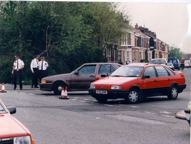 Police at the scene of the shooting of David Ungi