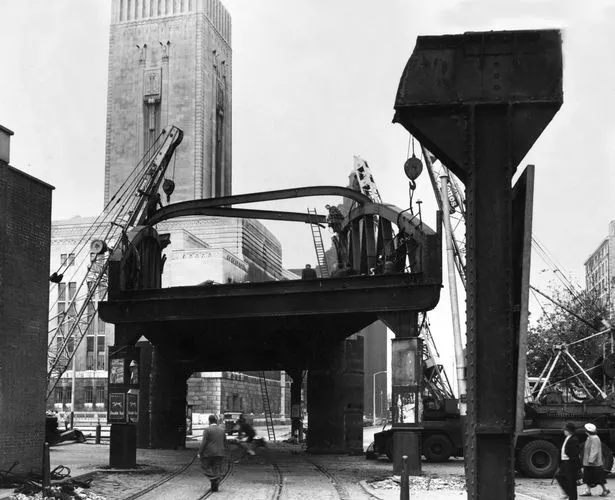 The dismantling of the final section of  the Liverpool Overhead Railway looking north along Dock Road. January 1958