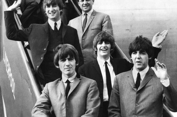 The Beatles arrive at Speke Airport, Liverpool in their home city ahead of the northern premiere of their first film "A Hard Day's Night"  in July 1964