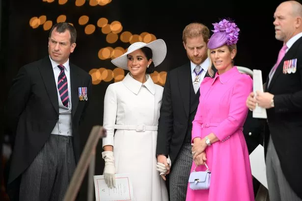 LONDON, ENGLAND - JUNE 03: (L-R) Peter Phillips, Meghan, Duchess of Sussex, Prince Harry, Duke of Sussex, Zara Phillips and Mike Tindall leave after the National Service of Thanksgiving to Celebrate the Platinum Jubilee of Her Majesty The Queen at St Paul's Cathedral on June 3, 2022 in London, England. The Platinum Jubilee of Elizabeth II is being celebrated from June 2 to June 5, 2022, in the UK and Commonwealth to mark the 70th anniversary of the accession of Queen Elizabeth II on 6 February 1952. (Photo by Daniel Leal - WPA Pool/Getty Images)