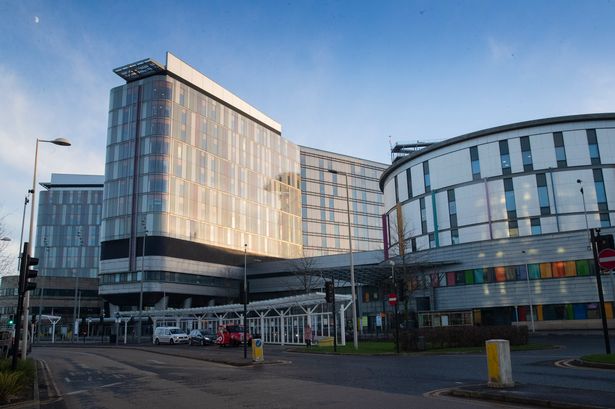 An image of the exterior of a modern hospital building.