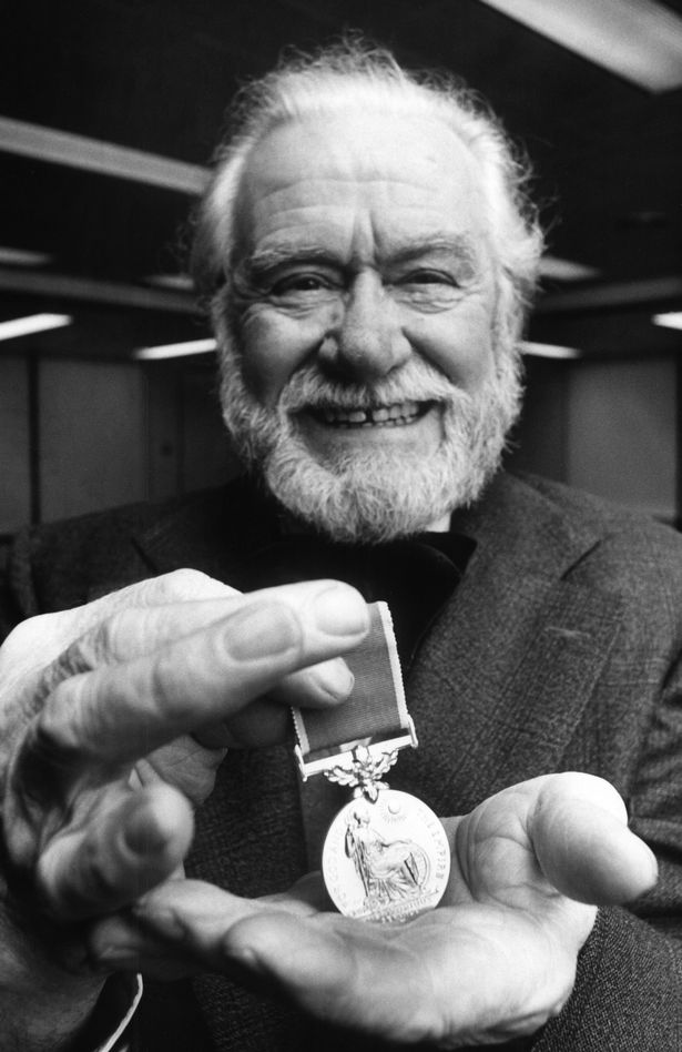 Stone carver Tom Murphy with his British Empire Medal. 19th October 1979.