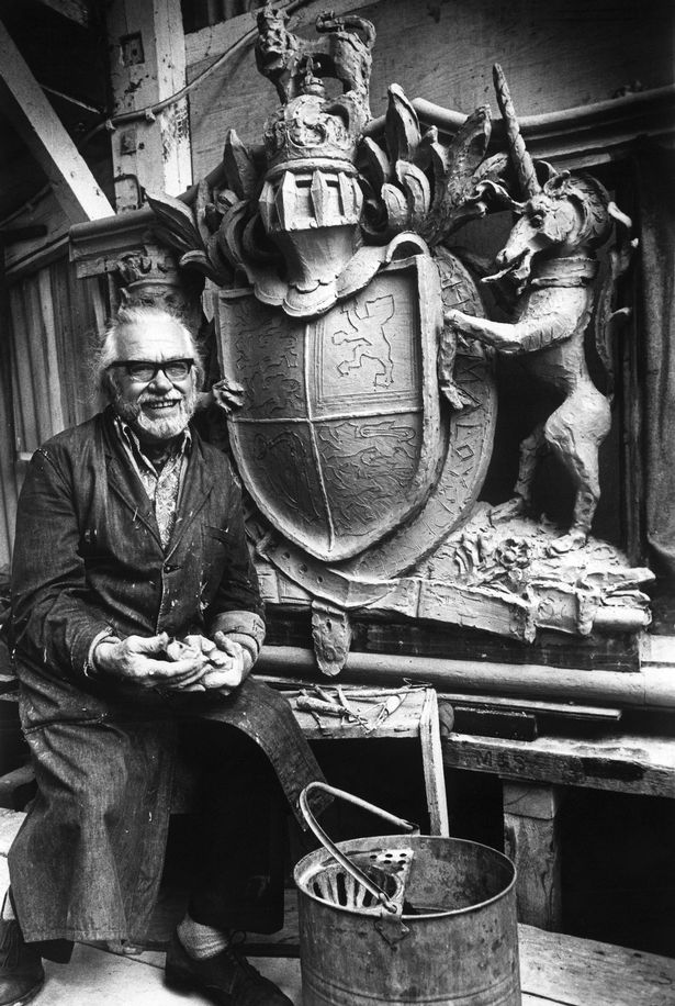 Stone carver, Tom Murphy, is designing a model of the Royal Coat of Arms which he will eventually transfer to local sandstone and it will take pride of place above the main entrance to the west wing of Liverpool Cathedral. June 1977.