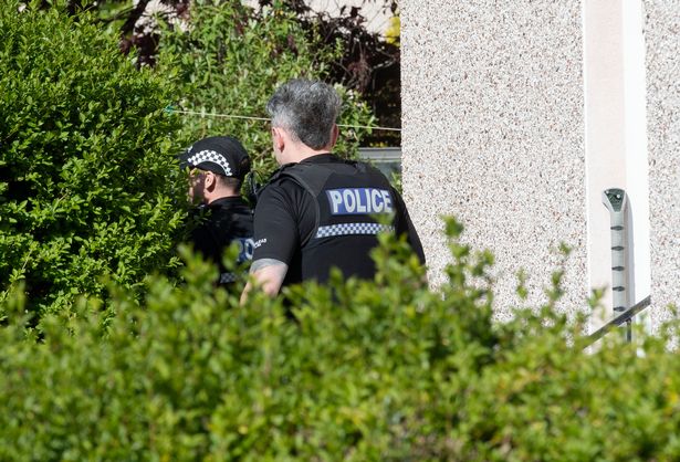 Officers carrying out an investigation at the scene