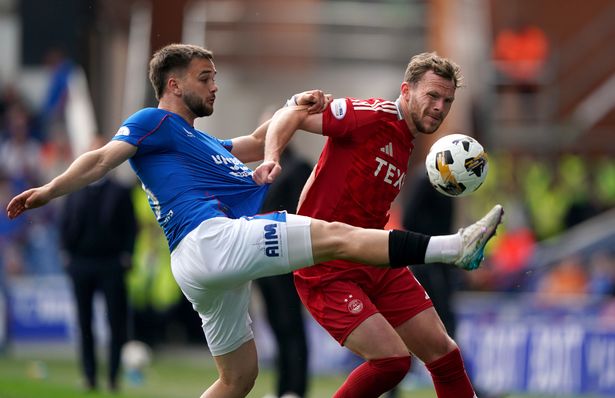 Rangers' Nicolas Raskin and Aberdeen's Nicky Devlin battle for the ball 
