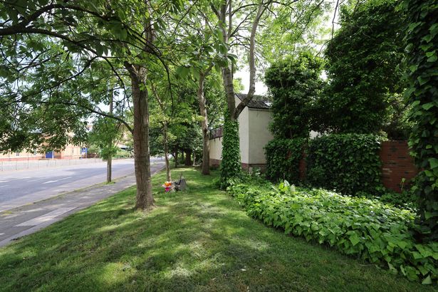 Diane Sindall's memorial and the chilling alleyway (right) where she was murdered in 1986
