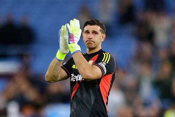 Emi Martinez of Aston Villa applauds the fans