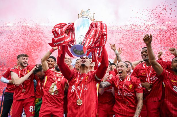 Virgil van Dijk of Liverpool lifts the trophy after the Premier League match between Liverpool FC and Crystal Palace FC at Anfield 